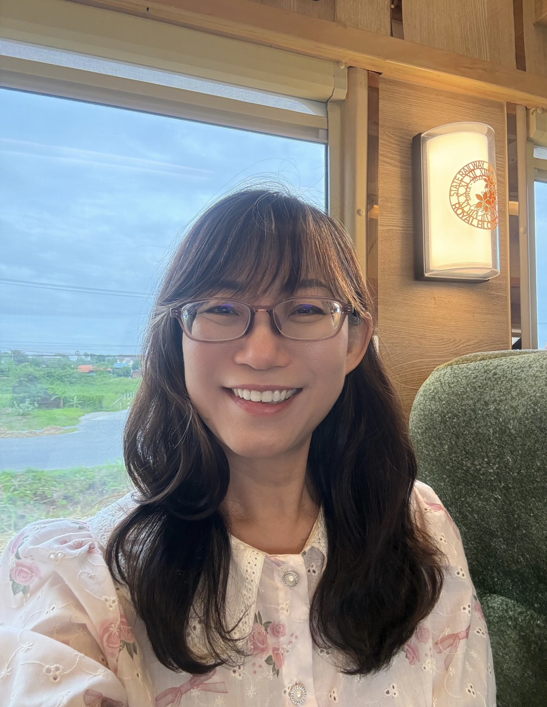 Wanida, founder of Heal with Wanida, in a warm candid portrait